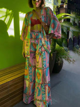 Pantalones anchos y sueltos con estampado retro único de sol deslumbrante